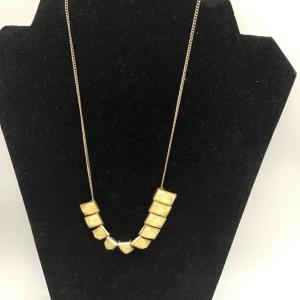 Photo of Unique golden toned necklace
