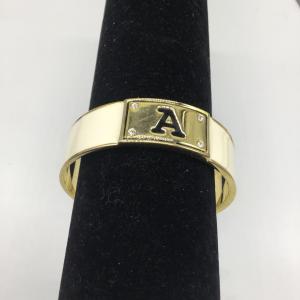 Photo of Gold toned and creme colored with letter A bracelet