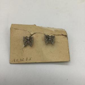 Photo of Silver toned butterfly earrings