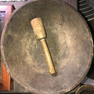 Photo of Primitive Bowl with a wooden pestle