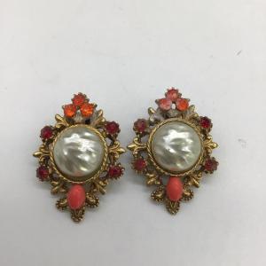 Photo of Red and orange vintage clip on earrings