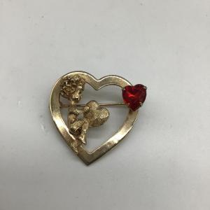 Photo of Cupid heart pin