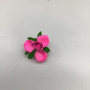 Photo of Hot pink flower pin