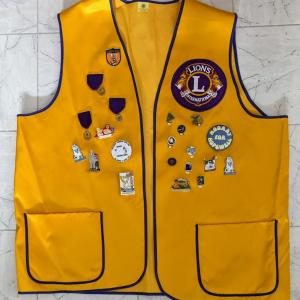 Photo of Lions Club International vest with Pins Attendance Virginia Jefferson Davis 1970