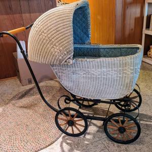 Photo of Antique wicker baby carriage / pram