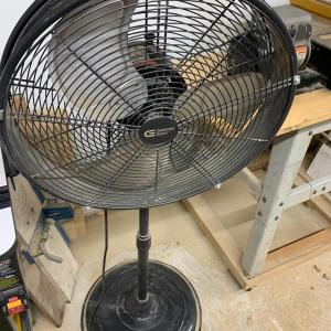 Photo of Industrial Commercial Electric Fan On Metal Base