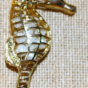 Photo of Unique "Pearls in the Belly Seahorse" PENDANT (3¾" x 1¼") on a Gold Tone Neckl