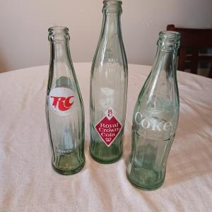 Photo of RC, COCA-COLA AND ROYAL CROWN GLASS BOTTLES