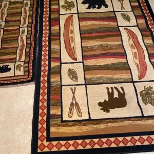 Photo of Bear & moose rugs
