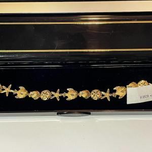 Photo of Vintage Never Worn 14K Starfish & Sand Dollar Bracelet 7" Weighing 7,5 Pennyweig