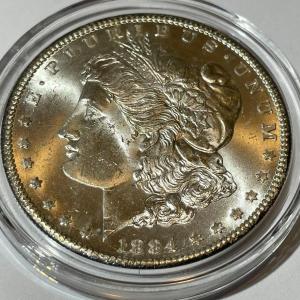 Photo of 1884-CC Morgan Silver Dollar. VAM-2. Repunched Date, 18/18. MS-63 Condition Unce