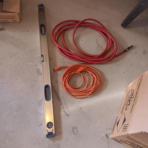 Photo of AN ALUMINUM LEVEL, EXTENSION CORD AND AIR HOSE