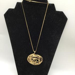 Photo of Gold toned pendant necklace