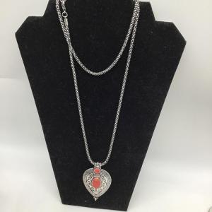 Photo of Treyo coral colored pendant necklace