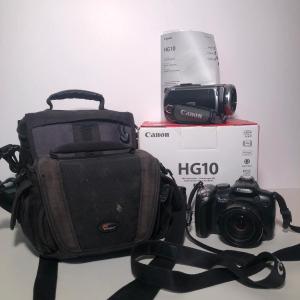 Photo of LOT 48B: Canon PowerShot SX20IS Digital Camera, Canon HG10 HD Camcorder w/ Remot