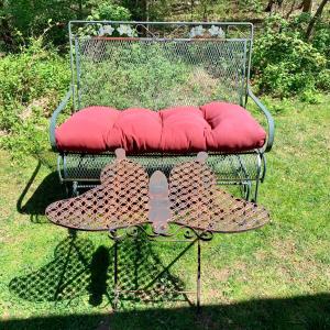 Photo of LOT 8 P: Wrought Iron Bench Glider w/ Cushion & Brushed Metal Butterfly Side Tab