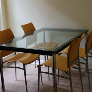 Photo of Glass Dining Set with Four Chairs