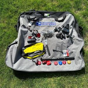 Photo of LOT 35B: United States Postal Service Masters Cycling Team Bag & Bicycle Accesso