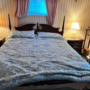 Photo of King four post bed and mattress