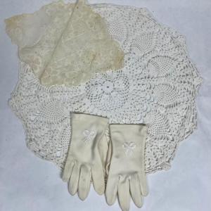 Photo of Vintage Doilies and pair of gloves