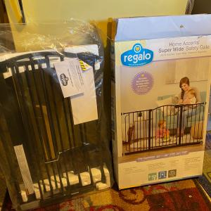 Photo of Baby Gates 1) new 1) Slightly used with Extensions Tall