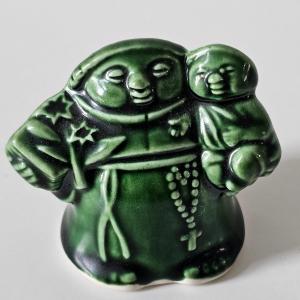 Photo of Green Figure Monk With Child