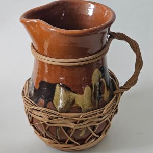 Photo of Vintage Slipware Sangria Pitcher With Basketry