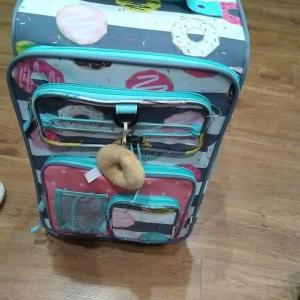 Photo of Cute rolling "Donut" carry on luggage