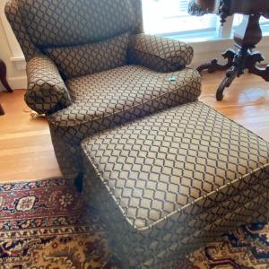 Photo of Brown and Black Quatrefoil Chair and Ottoman