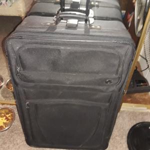 Photo of 32 in. Rolling suitcase 