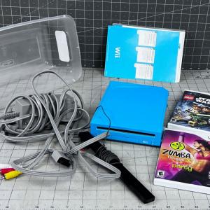 Photo of WII Console, Power Pack and Games - NO CONTROLLER 