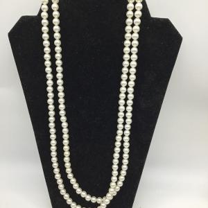 Photo of Sarah Coventry. Flapper Style extra long necklace