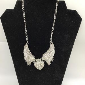 Photo of Wings with heart statement necklace