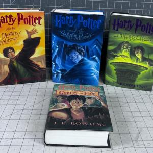 Photo of 4 Harry Potters Appear to be First EDITIONS 