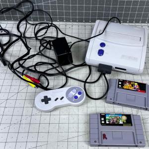 Photo of Super Nintendo Game Console with 2 Games 