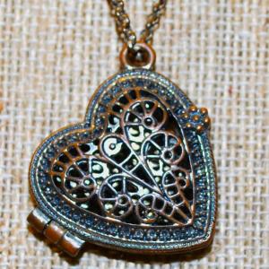 Photo of Bronze & Filigree Style Heart Locket Hinged PENDANT (1" x ¾") on a Dark Necklac