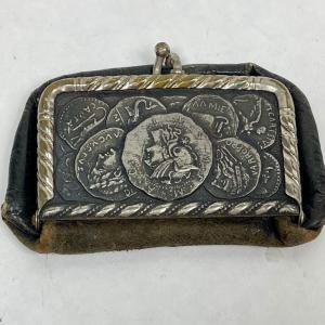 Photo of Vintage pocket-Sized Coin Purse with Roman Coin Design on Cover