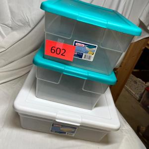 Photo of 3 assorted storage totes