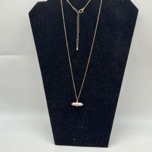 Photo of Gold toned crystal necklace