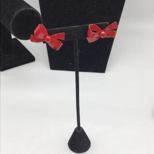 Photo of Red bow earrings