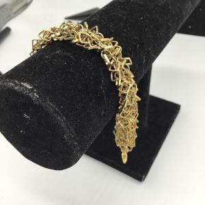 Photo of Gold toned fashion bracelet