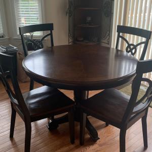 Photo of Round wood table & chairs
