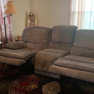 Photo of Sofa recliner must sale.
