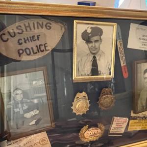 Photo of Chief of Police memorabilia w/ obsolete badges