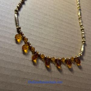 Photo of GOLD NECKLACE
