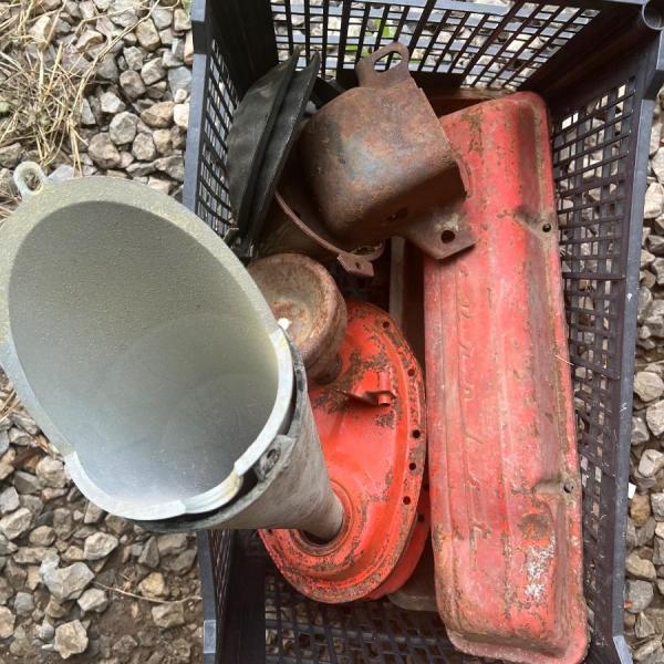 Photo of Plastic Tote with Chevrolet parts and other auto items