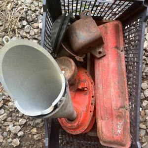 Photo of Plastic Tote with Chevrolet parts and other auto items