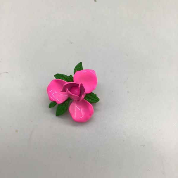 Photo of Hot pink flower pin