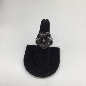 Photo of Dark colored flower ring