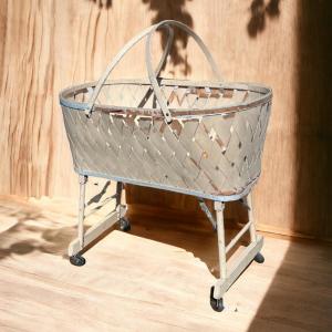 Photo of Antique Bassinet with Casters